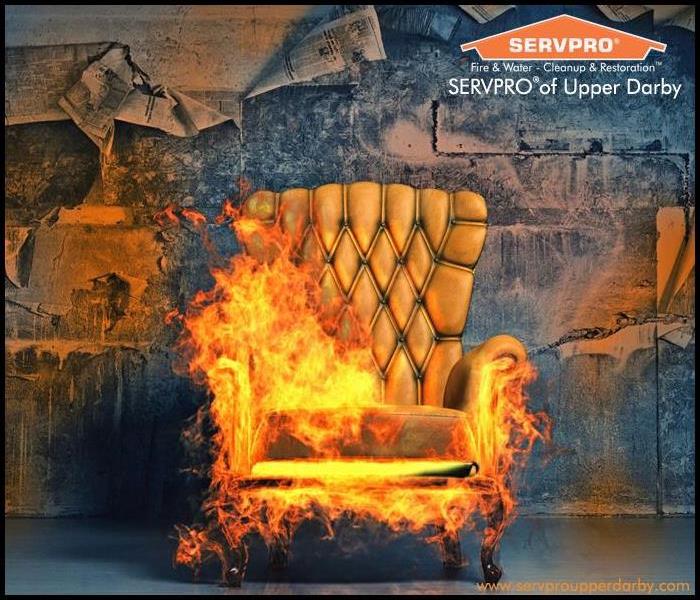 Gold high back upholstered chair in flames